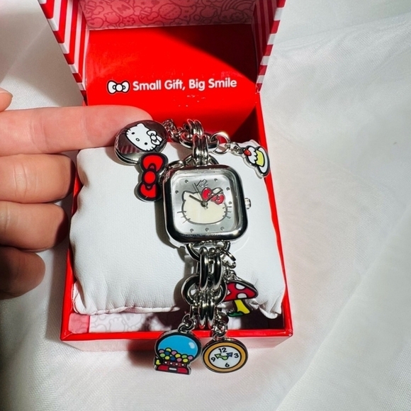 ❤️🔹️HELLO KITTY🔹️ by Sanrio Silver Multi Hello Kitty Charm Bracelet Watch ✨️ - Picture 1 of 9